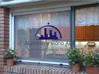 ALUMINIO Y VIDRIO ADR 